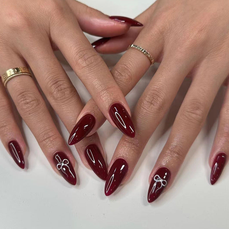Arco usa manicura uñas largas almendradas uñas postizas.